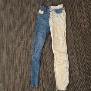 Skinny High rise Hollister jeans that have been hand bleached.